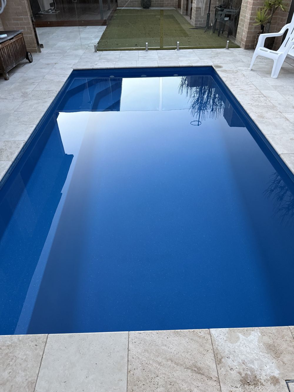 Pool vacuuming, done by hand, Canberra