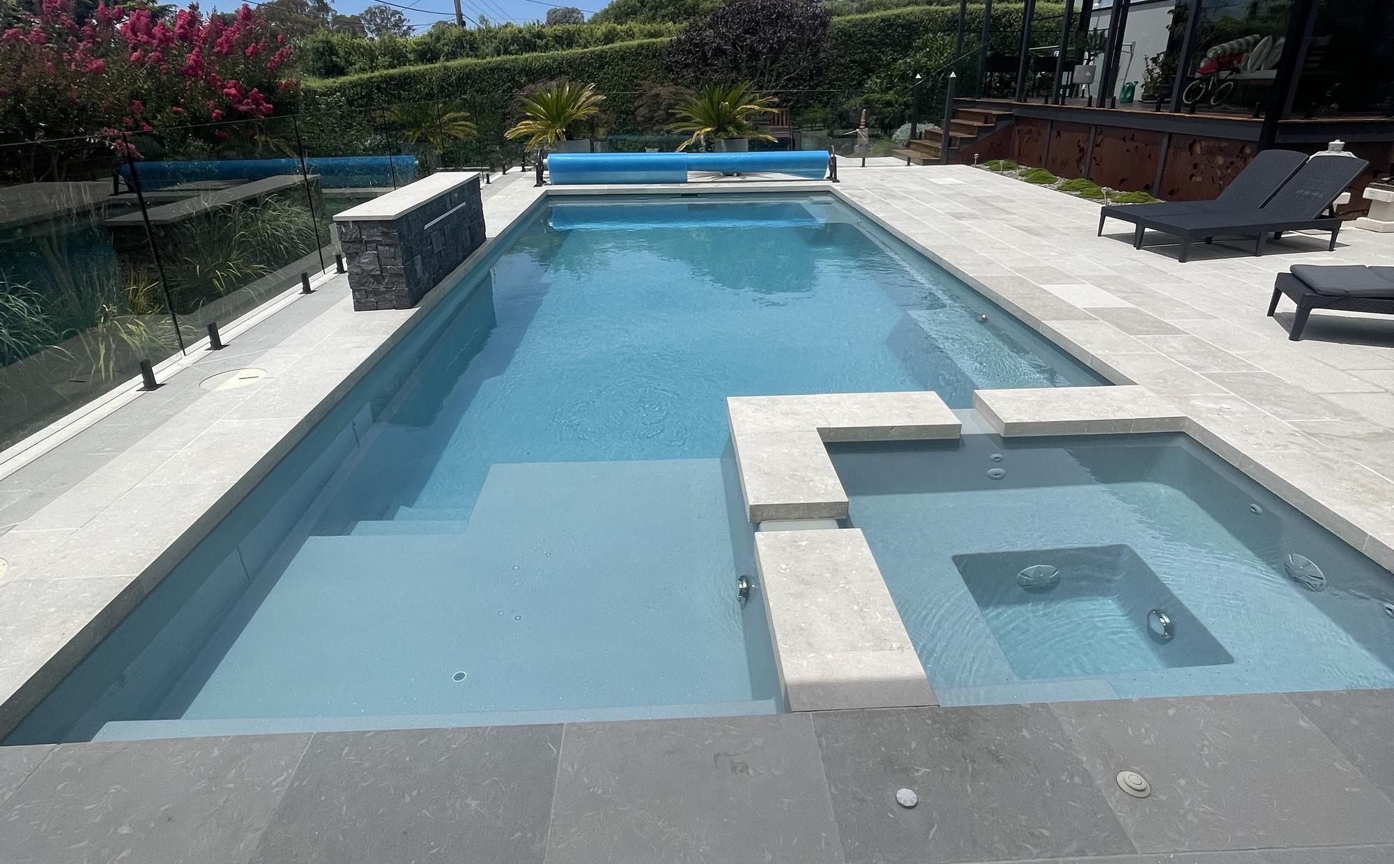 A clean backyard swimming pool in Canberra serviced by Billy&rsquo;s Pools