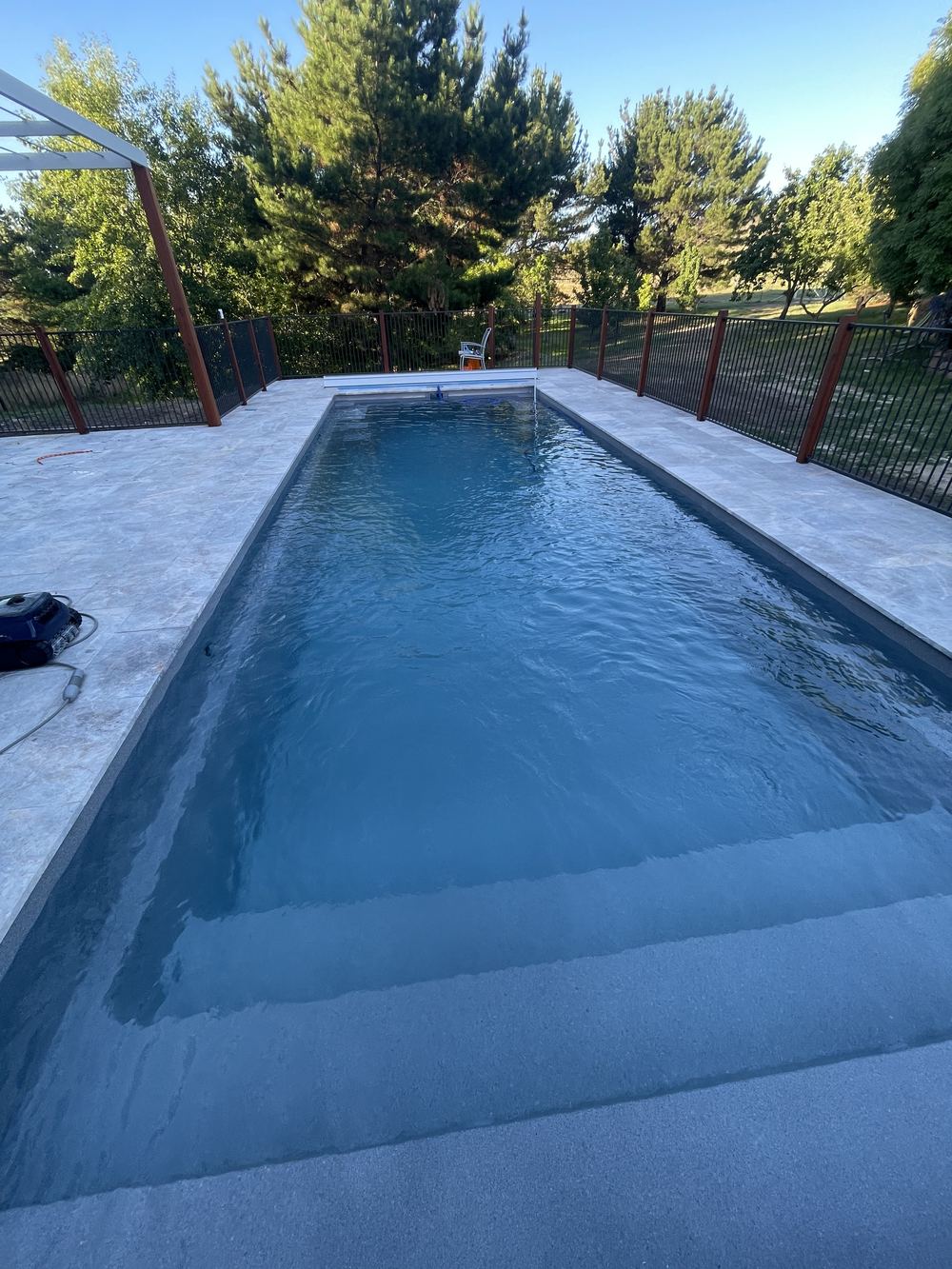 A clean Canberra backyard pool serviced by Billy&rsquo;s Pools