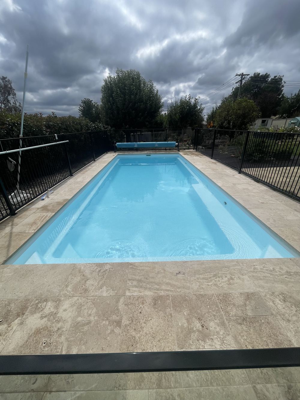 A clean Canberra backyard pool serviced by Billy&rsquo;s Pools